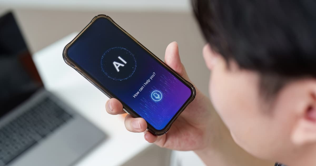 AI Interaction. Young man using smartphone with AI assistant.